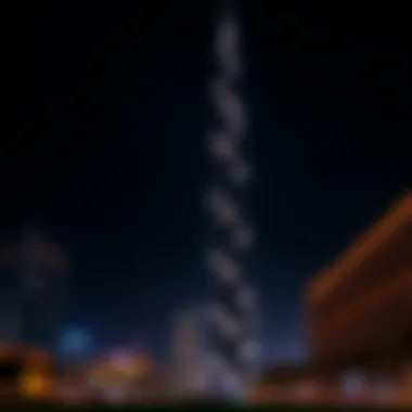 Dunya Tower: Illuminated Beauty at Night Dunya Tower illuminated at night, emphasizing its prominence in the urban landscape.
