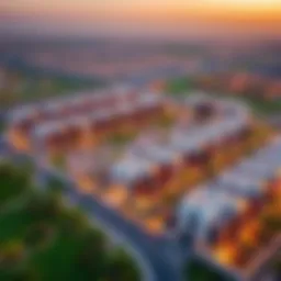 Aerial view of Aljada community showcasing modern architecture and green spaces